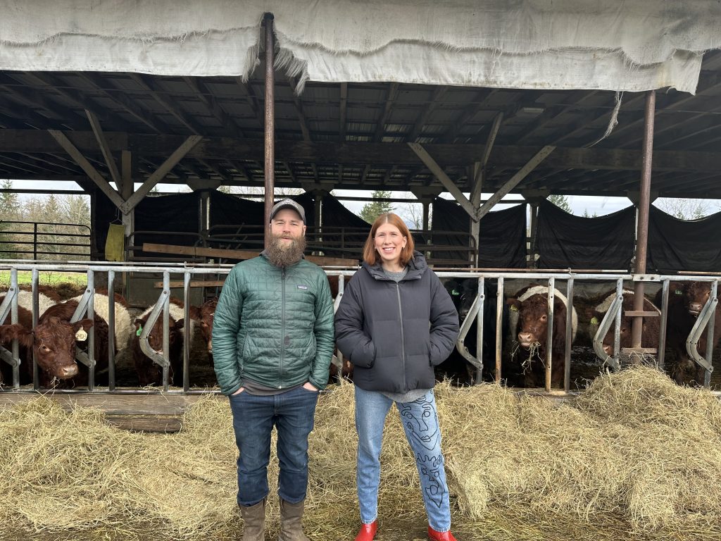 What ‘Farm-to-Table’ Actually Means at Red Clog Kitchen 9 Chef Maty from Red Clog Kitchen in Woodinville smiling with Eric from Carnation Farms in front of their cattle