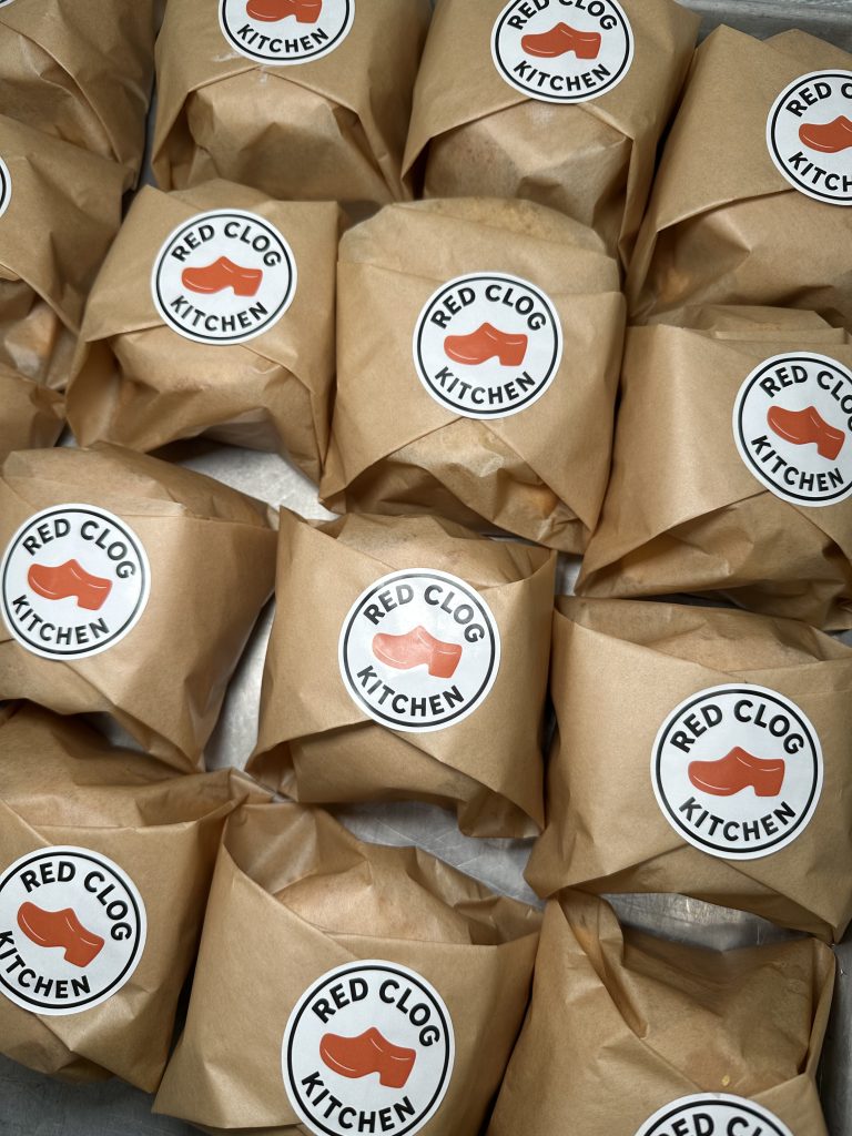 Breakfast Sandwiches wrapped up Red Clog Kitchen packaging